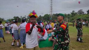 HUT RI ke-78, peringatan, Satgas Yonif 310/KK, layang-layang merah putih, perbatasan Papua