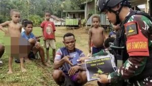 Perbatasan RI-PNG, Meningkatkan Ketaqwaan, Distribusi Alkitab, Satgas Yonif 310/KK, Papua